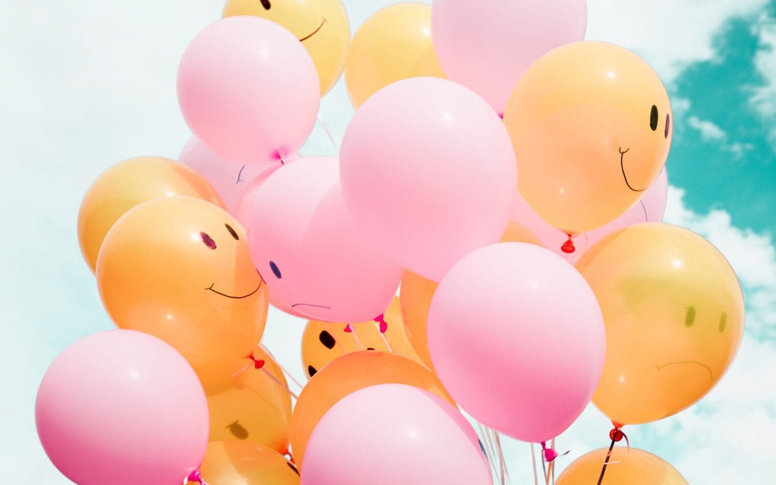 Balloons with emotions in the sky