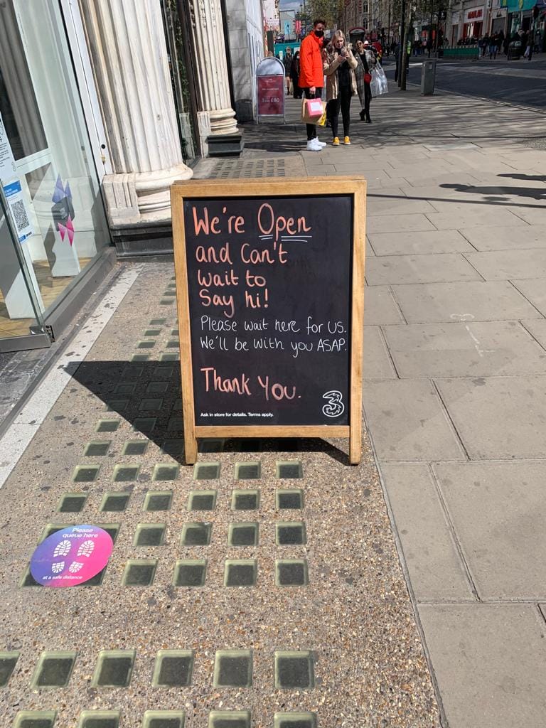 socially distancing sign